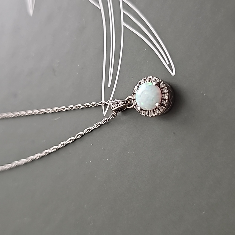 Helzberg opal necklace and earrings